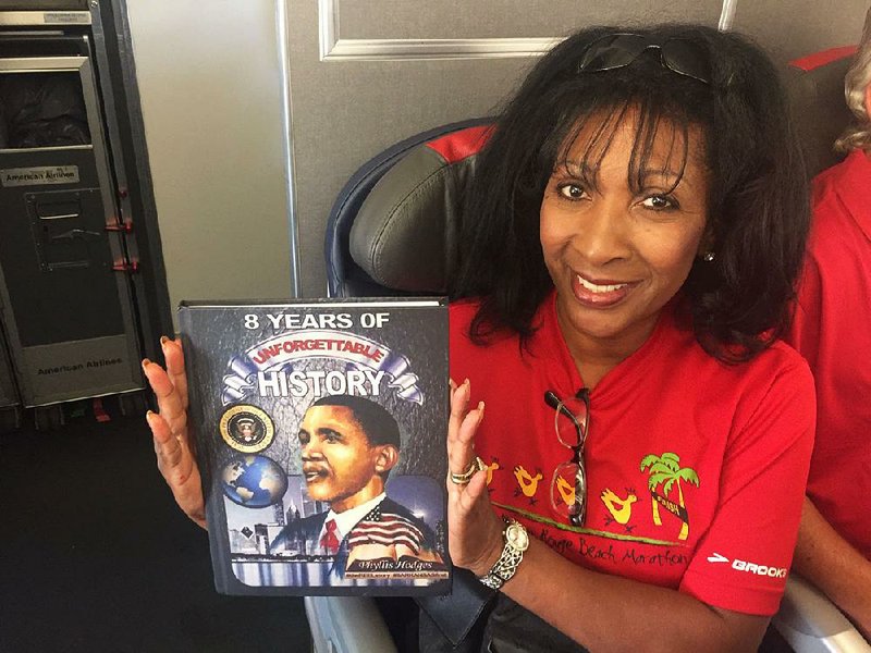 Phyllis Hodges shows her book during her stop in Washington. 