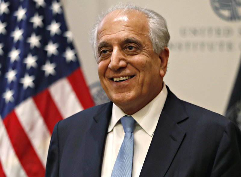 FILE - In this Feb. 8, 2019, file photo, Special Representative for Afghanistan Reconciliation Zalmay Khalilzad at the U.S. Institute of Peace, in Washington. A fresh round of talks between the U.S. and the Taliban is to begin in Qatar Saturday, June 29, just days after U.S. Secretary of State Mike Pompeo said Washington is hoping for an Afghan peace agreement before Sept. 1. (AP Photo/Jacquelyn Martin, File)