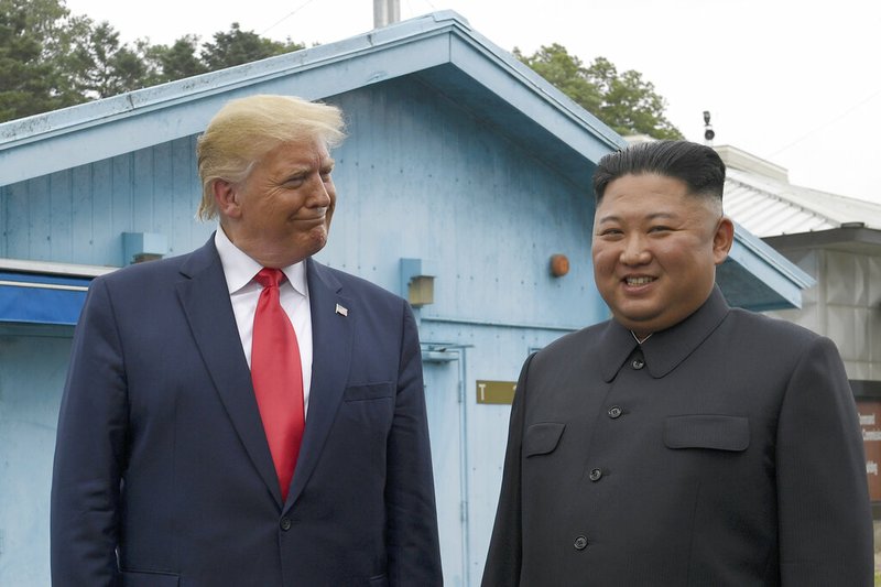 President Donald Trump meets with North Korean leader Kim Jong Un at the border village of Panmunjom in the Demilitarized Zone, South Korea, Sunday, June 30, 2019. (AP Photo/Susan Walsh)