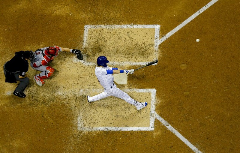 Milwaukee Brewers' Christian Yelich hits a two-run home run during the fifth inning of a baseball game against the Cincinnati Reds Friday, June 21, 2019, in Milwaukee. (AP Photo/Morry Gash)