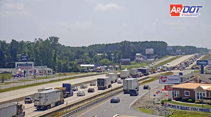 This screenshot of an Arkansas Department of Transportation video shows traffic Interstate 30 on Tuesday afternoon. The camera is positioned west of the Bryant Parkway exit, where officials said a downed power line prompted the closure of the interstate's eastbound lanes.