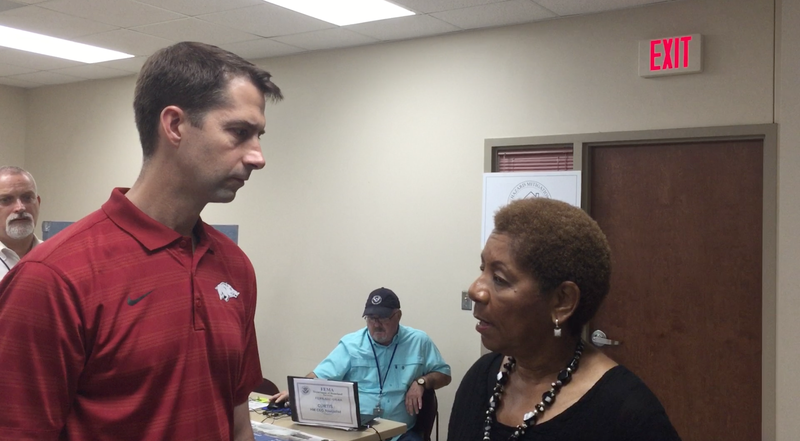 Sen. Tom Cotton speaks with Pine Bluff Mayor Shirley Washington about flooding repair efforts, Tuesday, July 2.