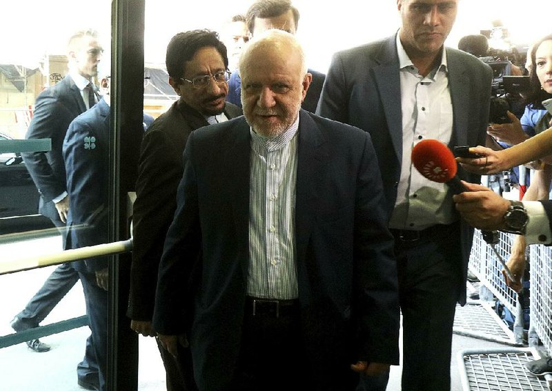 Iran’s Minister of Petroleum Bijan Namdar Zangeneh arrives Tuesday at the Organization of the Petroleum Exporting Countries headquarters in Vienna, where members and 10 nonmember oil exporting countries agreed to extend production cuts for nine months.