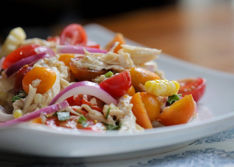 Chicken, Tomato and Corn Salad takes advantage of rotisserie or leftover chicken for an easy supper. Photo by John Sykes Jr.