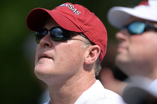 Hunter Yurachek, director of athletics at Arkansas, watches Saturday, May 25, 2019, during the second day of play in the NCAA Men's Golf Championships at Blessings Golf Club in Johnson.