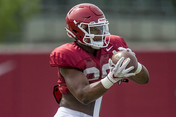 Arkansas linebacker Andrew Parker catches a ball during practice Wednesday, Aug. 8, 2018, in Fayetteville.