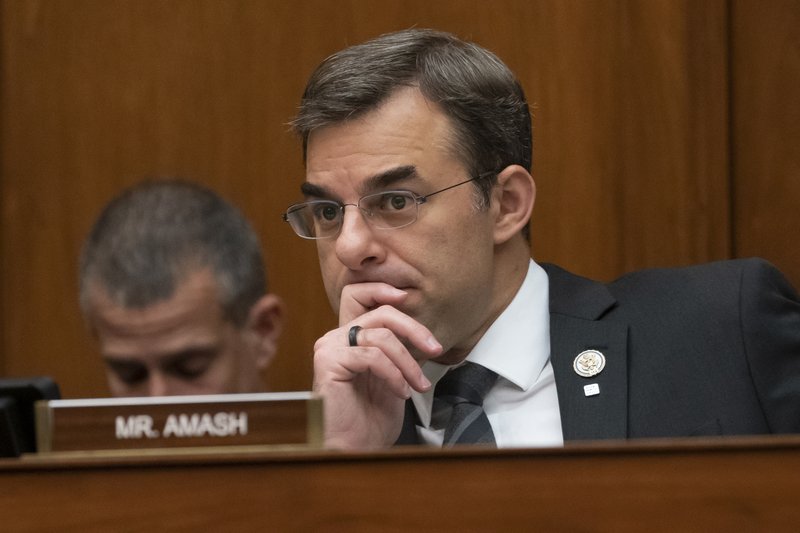 U.S. Rep. Justin Amash, R-Mich., listens to debate during a meeting of the House Oversight and Reform Committee on Capitol Hill in Washington in this June 12, 2019, file photo. The committee was considering whether to hold Attorney General William Barr and Commerce Secretary Wilbur Ross in contempt for failing to turn over subpoenaed documents related to the Trump administration's decision to add a citizenship question to the 2020 census.