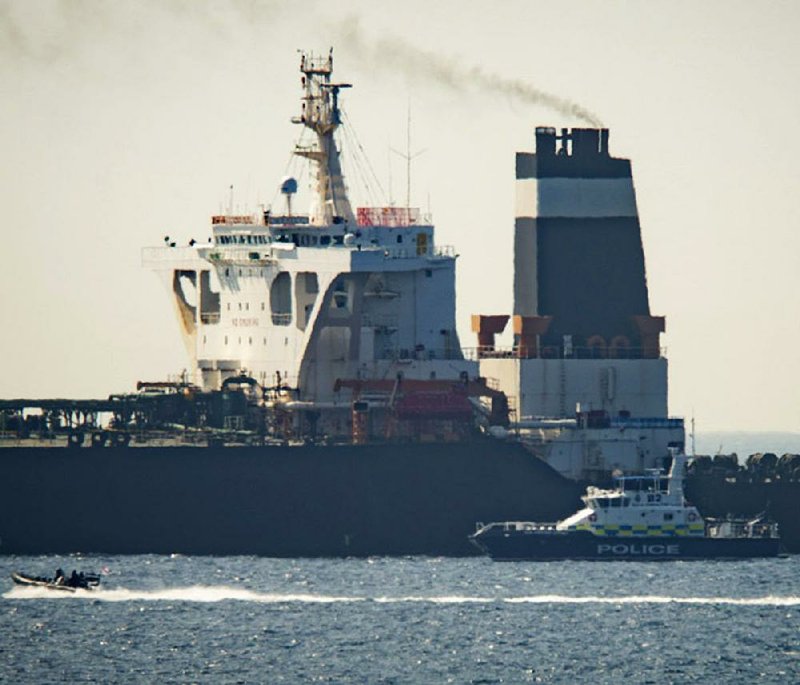 A British Royal Marines patrol ship sits alongside the Grace 1 supertanker Thursday in the British territory of Gibraltar. 