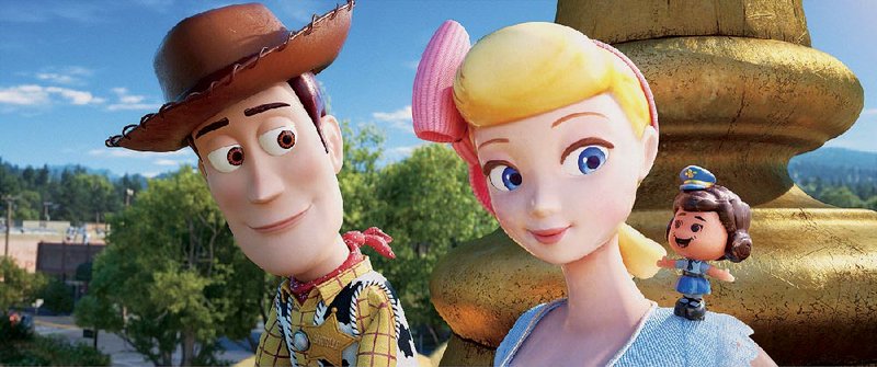 Woody (voice of Tom Hanks) and Bo Peep (Annie Potts) ponder a childless existence in Toy Story 4. 