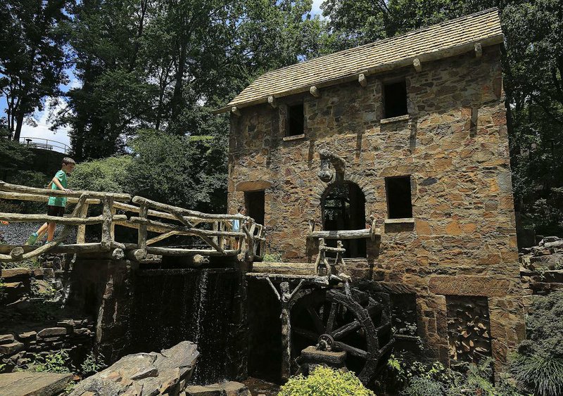 North Little Rock officials said they hope the cascading waterfall, which will help power the wheel of the gristmill, will be completed by the end of the month. 