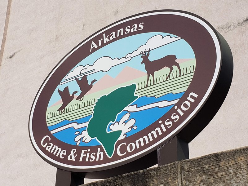 FILE — An Arkansas Game and Fish Commission sign in downtown Little Rock is shown in this 2019 file photo.