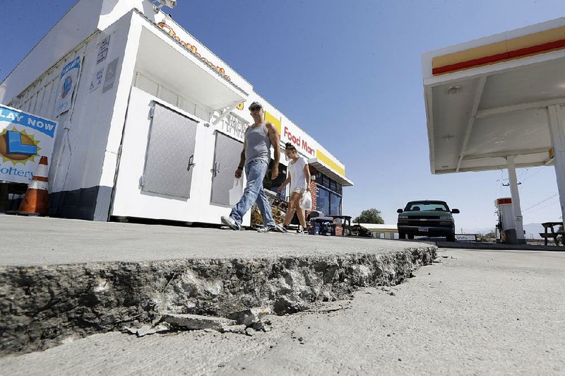 An earthquake shifted the ground outside this gas station in Trona, Calif. 