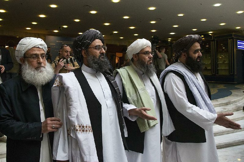 Taliban officials are shown during a meeting in May in Moscow, where Afghan sides exchanged views on peace. The latest round of talks between the Taliban and the U.S., held in Qatar, is showing “substantive” progress, U.S. peace envoy Zalmay Khalilzad said Saturday. 