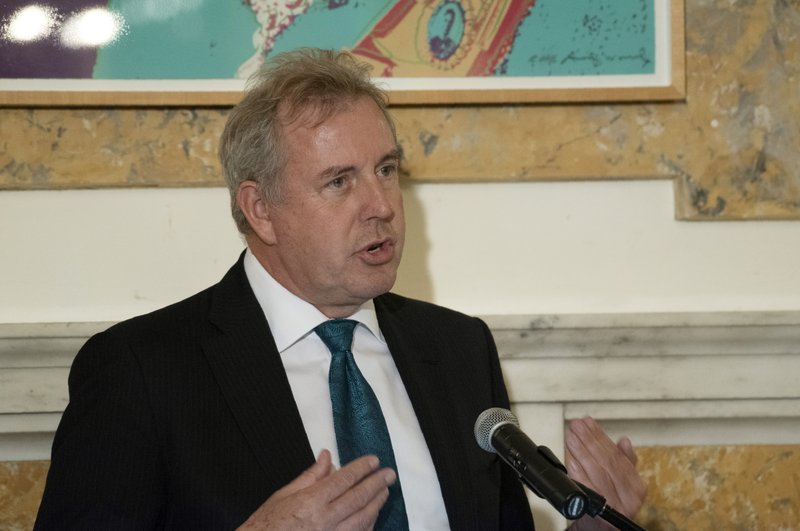 In this Friday, Oct. 20, 2017 photo, British Ambassador Kim Darroch hosts a National Economists Club event at the British Embassy in Washington. Leaked diplomatic cables published Sunday, July 7,2 019, in a British newspaper reveal that Britain's ambassador to the United States described President Donald Trump's administration as &quot;clumsy and inept&quot; while grappling with international problems.  (AP Photo/Sait Serkan Gurbuz)