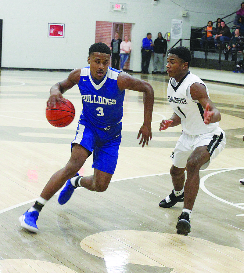 Strong's Derrion Davis drives to the basket against Smackover last season. Davis, competing for Little Rock's Spartan Blue, will play in the Powerade Peach Jam Tournament this week in Augusta, Georgia.