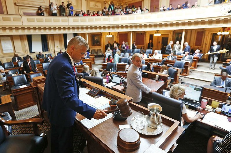 Virginia House Speaker Kirk Cox opens the short-lived special session Tuesday at the state Capitol in Richmond. 