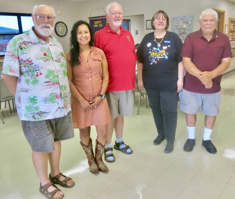 Westside Eagle Observer/SUSAN HOLLAND New officers of the Gravette Lions Club pose just after being installed at the July 2 meeting of the club. Officers for the 2019-2020 Lions year are Jeff Davis (left), treasurer; Cela Gaytan, vice-president; Al Blair, president; Karen Benson, tail twister; and Bill Mattler, secretary. Davis, first vice district governor, installed the other officers and he, in turn, was installed by zone chairman Mattler.