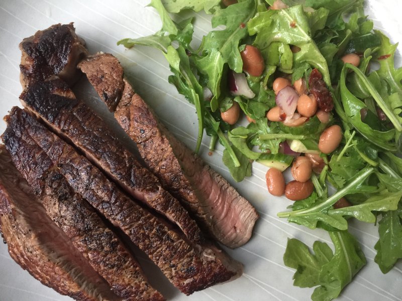 Pan-Seared Sirloin With Pinto Bean and Arugula Salad Photo by Kelly Brant