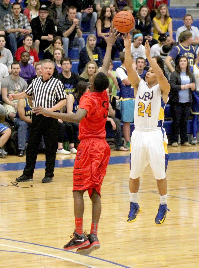 Photo courtesy of JBU Sports Information Former John Brown guard Abel Galliguez, right, is in his fifth season playing professional basketball in the Philippines.