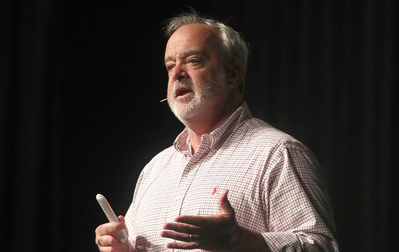 The Sentinel-Record/Richard Rasmussen FUNNY MAN IN CHARGE: Gerry Brooks, a school administrator and comedian, speaks at the Arkansas School Counselor Association's conference at the Hot Springs Convention Center on Tuesday.