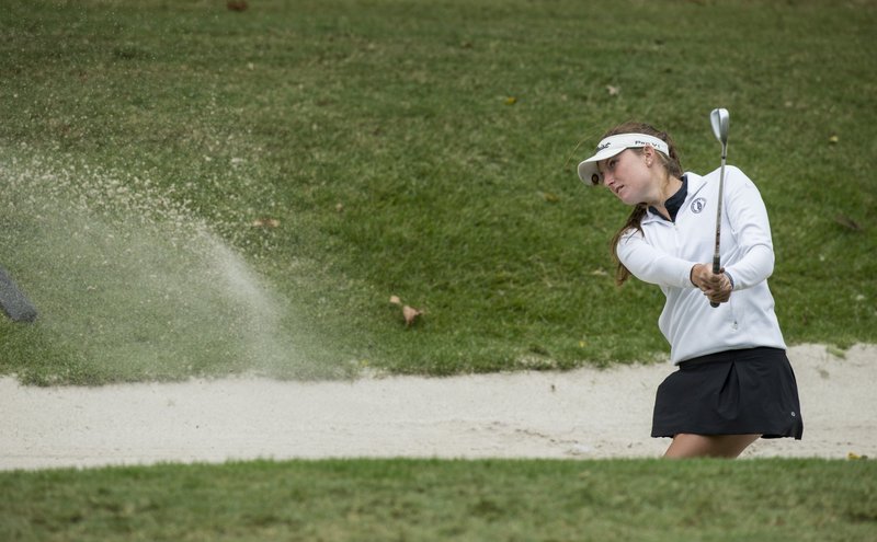 Lilly Thomas of Bentonville hits from a bunker on No. 18 Wednesday, Sept. 26, 2018, during the class 6A girls golf state championship at Shadow Valley Country Club in Rogers.