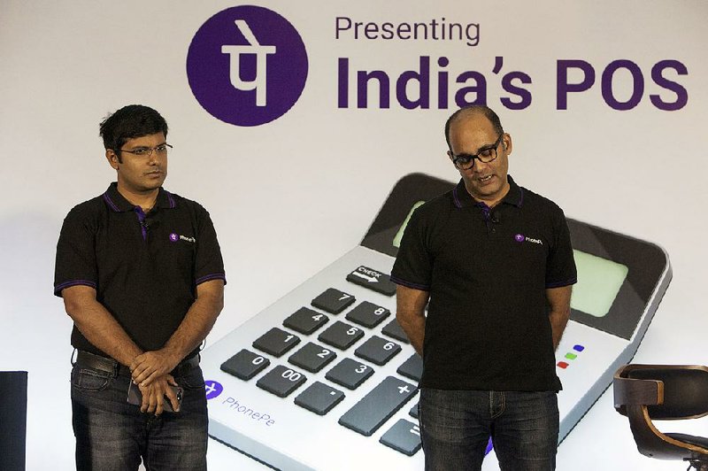 Rahul Chari (left) and Sameer Nigam, co-founders of PhonePe, speak during a product unveiling in Bengaluru, India, in 2017.