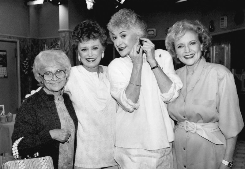 AP/NICK UT This Dec. 25, 1985, file photo shows Estelle Getty (from left), Rue McClanahan, Bea Arthur and Betty White, the stars of the the NBC series The Golden Girls, (during a break in taping in Hollywood). The sitcom, which followed four women of a certain age living together in Miami, aired on NBC from 1985 to 1992. Nearly 35 years later, it continues to gain new fans and has inspired a wave of merchandising.
