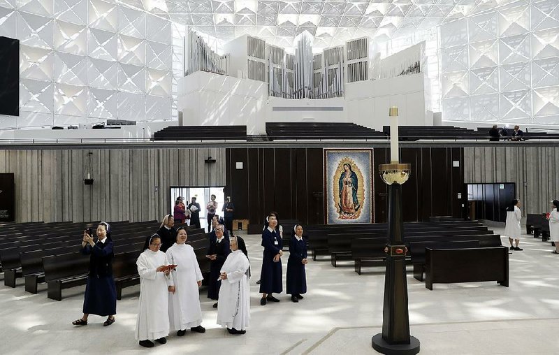 Nuns get a first look at the newly renovated Christ Cathedral on Monday in Garden Grove, Calif. The 88,000-square-foot Catholic church has undergone a $77 million renovation. 