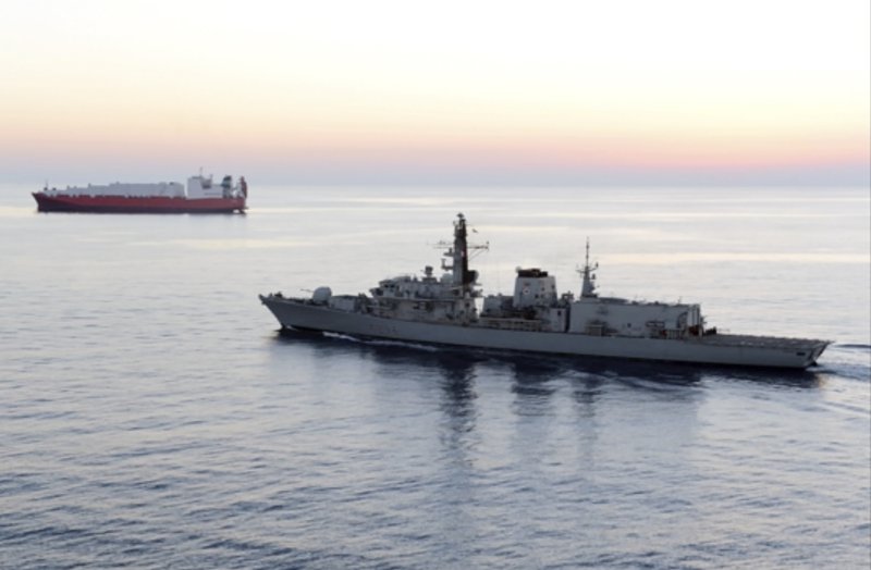 In this image from file video provided by UK Ministry of Defence, British navy vessel HMS Montrose escorts another ship during a mission to remove chemical weapons from Syria at sea off coast of Cyprus in February 2014. The British Navy said it intercepted an attempt on Thursday, July 11, 2019, by three Iranian paramilitary vessels to impede the passage of a British commercial vessel just days after Iran&#x2019;s president warned of repercussions for the seizure of its own supertanker. A U.K. government statement said Iranian vessels only turned away after receiving &#x201c;verbal warnings&#x201d; from the HMS Montrose accompanying the commercial ship through the narrow Strait of Hormuz. (UK Ministry of Defence via AP)