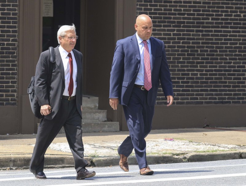 Former state senator Jeremy Hutchinson (right) arrives Tuesday, June 25, 2019, at the federal courthouse in Little Rock with his attorney Tim Dudley.