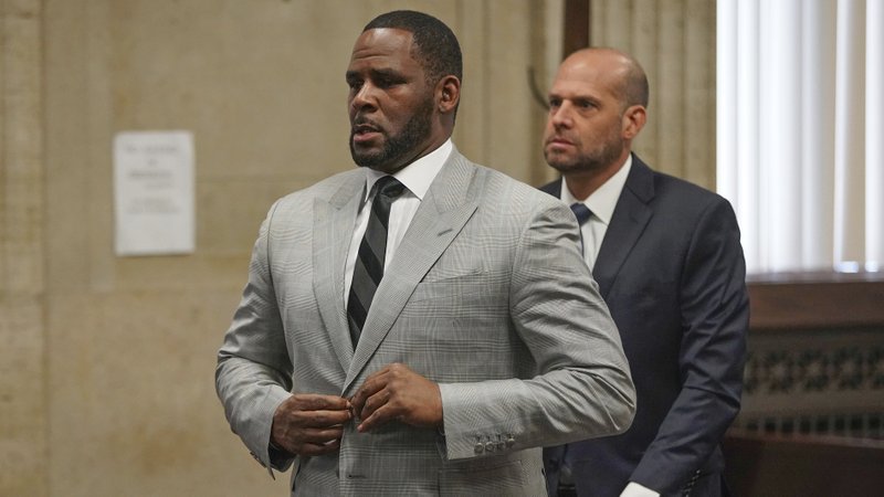 In this June 6, 2019, file photo, singer R. Kelly pleaded not guilty to 11 additional sex-related felonies during a court hearing before Judge Lawrence Flood at Leighton Criminal Court Building in Chicago.