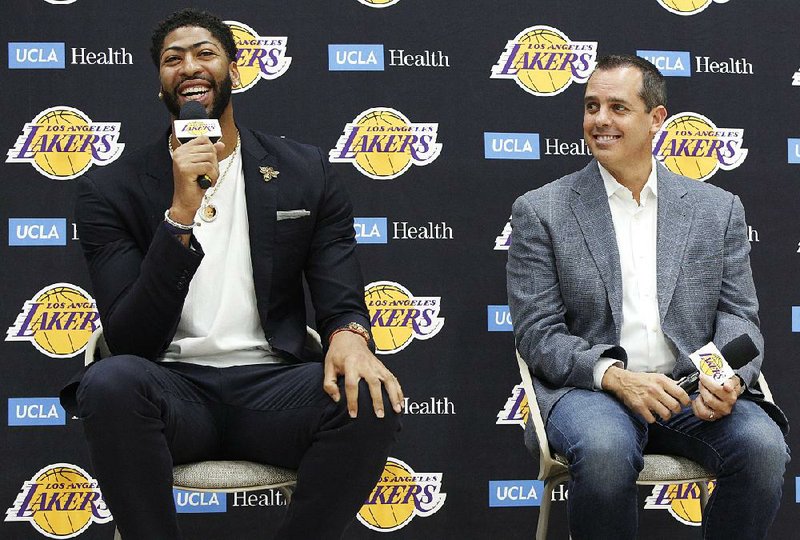 Los Angeles Lakers Coach Frank Vogel (right) introduces Anthony Davis at a news conference Saturday at the UCLA Health Training Center in El Segundo, Calif. 