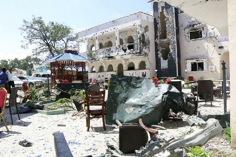 The damaged Asasey Hotel is shown Saturday after the attack in Kismayo, Somalia.