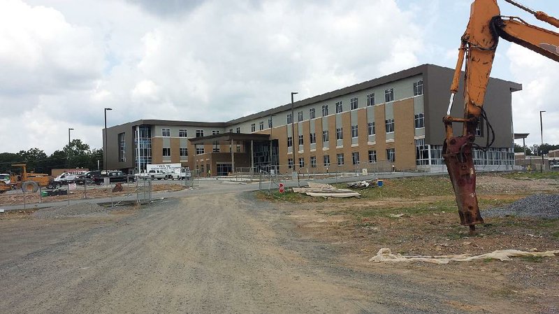 The classroom building addition to Pulaski County Special School District’s Sylvan Hills High School in Sherwood is to open to students next month. 