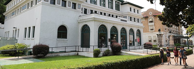 The Sentinel-Record/Richard Rasmussen MAURICE: Pedestrians stroll past the vacant Maurice Bath House recently. The building, once considered one of the most elegant on Bathhouse Row, is the only one to remain unrestored and empty.