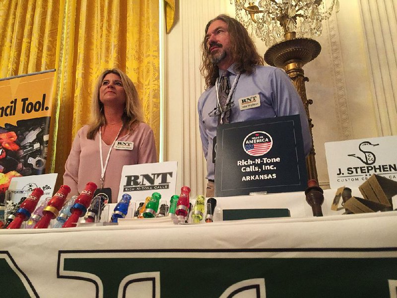 Angie and John Stephens display their Rich-N-Tone Duck Calls on Monday at a White House event to show off products made in the United States. One of the visitors to the Stuttgart company’s table was Ben Carson, secretary of the U.S. Department of Housing and Urban Development. Vice President Mike Pence also dropped by. 