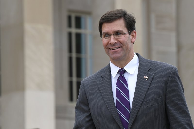 In this July 8, 2019, photo, acting Secretary of Defense Mark Esper waits for the arrival of Qatar's Emir Sheikh Tamim bin Hamad Al Thani to the Pentagon. The Pentagon says that Esper expects to be formally nominated for the top job very soon, setting off a complicated leadership replacement shuffle at top Army, Navy and senior Defense Department levels(AP Photo/Susan Walsh)