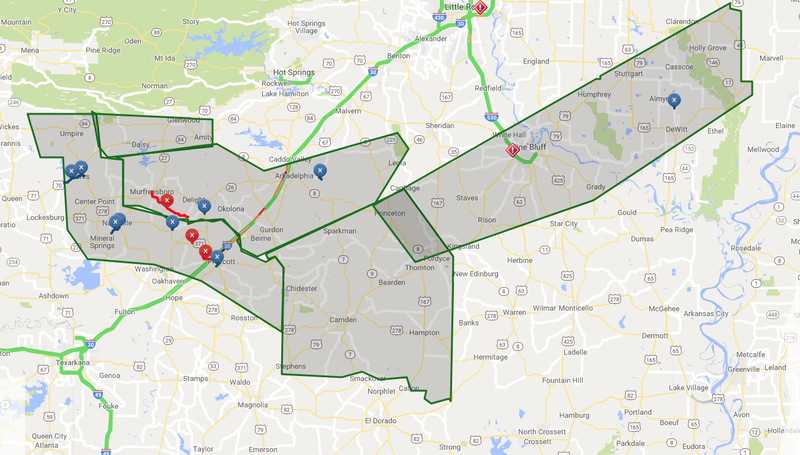 This screenshot from IDriveArkansas.com shows road closures across southwest Arkansas. High water is noted by the blue dots. The red dots represent washouts or other issues that have shut the road.