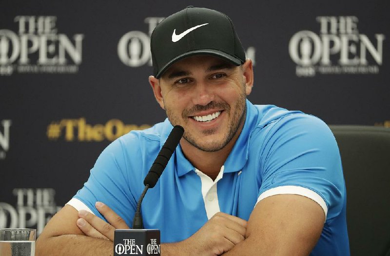 Brooks Koepka of the United States speaks at a press conference ahead of the start of the British Open golf championships Royal Port Rush in Northern Ireland, Tuesday, July 16, 2019.