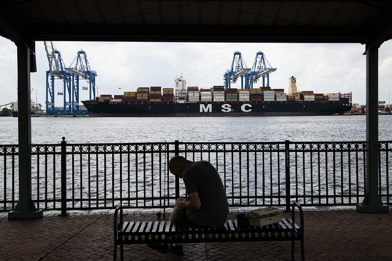 A container ship sits docked last month on the Delaware River in Philadelphia. The Trump administration says Tuesday’s World Trade Organization ruling makes WTO rules “less effective to counteract Chinese subsidies.” 