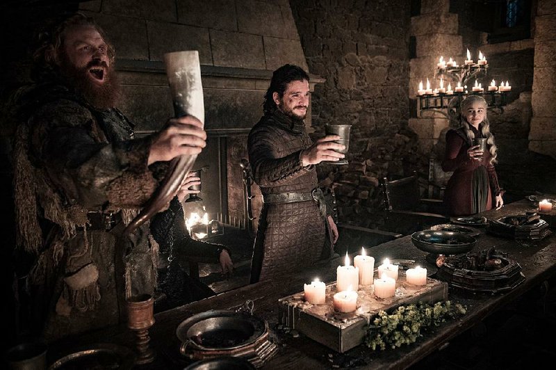 Kristofer Hivju (from left), Kit Harington and Emilia Clarke are shown in a scene from Game of Thrones, which is in the hunt for a fourth Emmy for best series among its 27 nominations, including best actress for Clarke. 