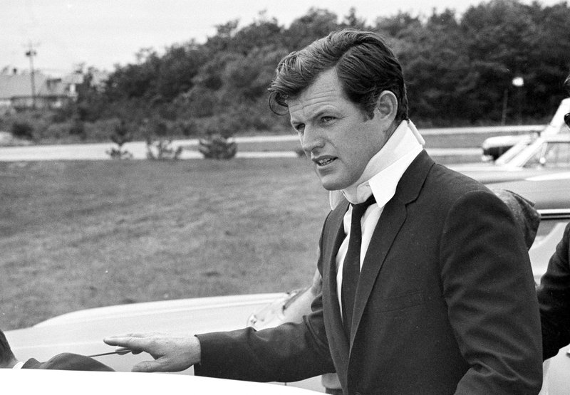 FILE - In this July 22, 1969 file photograph, U.S Sen. Edward Kennedy, D-Mass., arrives back home in Hyannis, Mass., after attending the funeral of Mary Jo Kopechne in Pennsylvania. Kopechne drowned when a car driven by Kennedy went off a bridge on Chappaquiddick Island, at the eastern end of Martha's Vineyard. It's been 50 years since the fateful automobile accident that killed a woman and thwarted Kennedy's presidential aspirations. (AP Photo/Frank C. Curtin, File)
