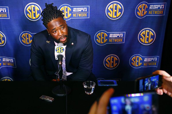 Arkansas defensive lineman McTelvin Agim speaks to reporters during the NCAA college football Southeastern Conference Media Days, Wednesday, July 17, 2019, in Hoover, Ala. (AP Photo/Butch Dill)