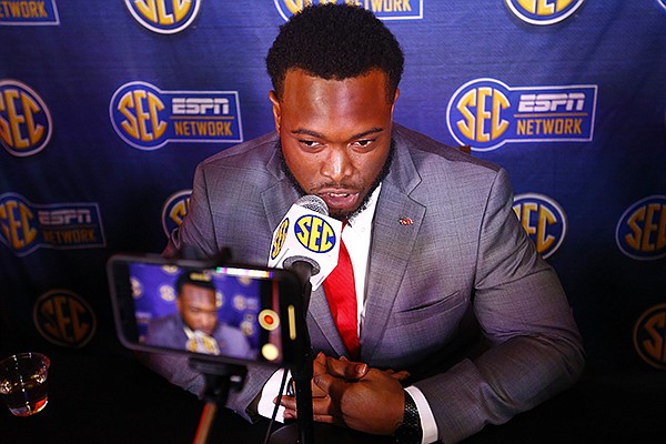 Arkansas linebacker De'Jon Harris speaks to reporters during the NCAA college football Southeastern Conference Media Days, Wednesday, July 17, 2019, in Hoover, Ala. (AP Photo/Butch Dill)



