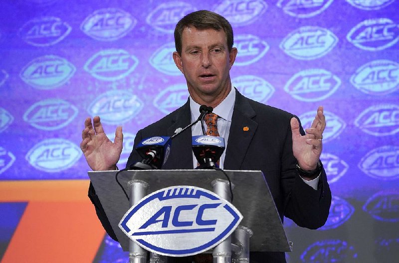 Clemson head coach Dabo Swinney speaks during the Atlantic Coast Conference NCAA college football media day in Charlotte, N.C., Wednesday, July 17, 2019.