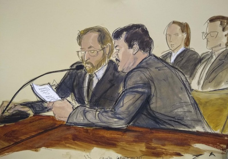 In this courtroom sketch, Joaquin &quot;El Chapo&quot; Guzman, foreground right, reads a statement through an interpreter during his sentencing in federal court, Wednesday, July 17, 2019, in New York. The Mexican drug kingpin, who was convicted in February 2019 on multiple conspiracy counts in an epic drug-trafficking case, was sentenced to life behind bars in a U.S. prison Wednesday. (Elizabeth Williams via AP)