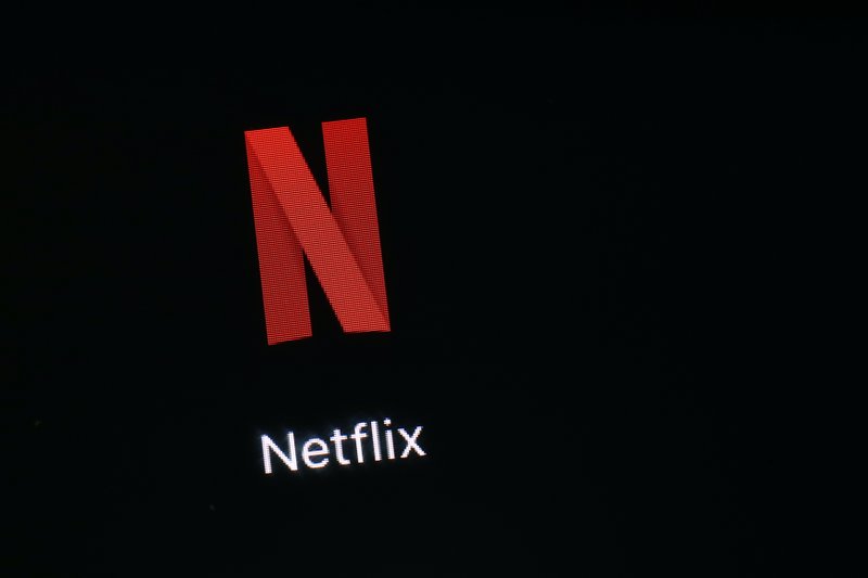 FILE - This March 19, 2018, file photo shows the Netflix app on an iPad in Baltimore. Netflix reports earnings Wednesday, July 17, 2019. (AP Photo/Patrick Semansky, File)