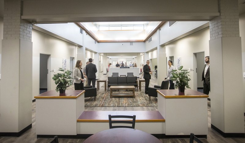 Guests look around Friday, June 14, 2019, after a ribbon cutting ceremony for the Northwest Arkansas Crisis Stabilization Unit in Fayetteville.