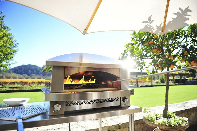 Along with a good gas-fired grill, many homeowners are adding a pizza oven to their outdoor cooking area.