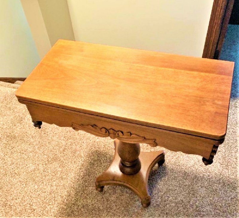 Made from walnut,  this  table  is  a  good deal. 